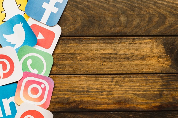 Various social media icons on plywood